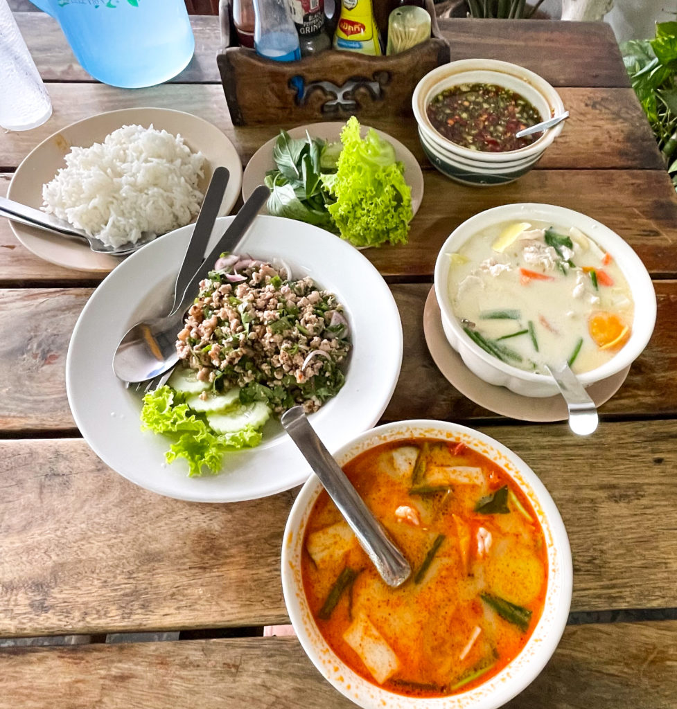 Tom ka (middle right) tom yum (bottom), and pork larb (middle left), “Cheap Ass” Thai Food, Phuket