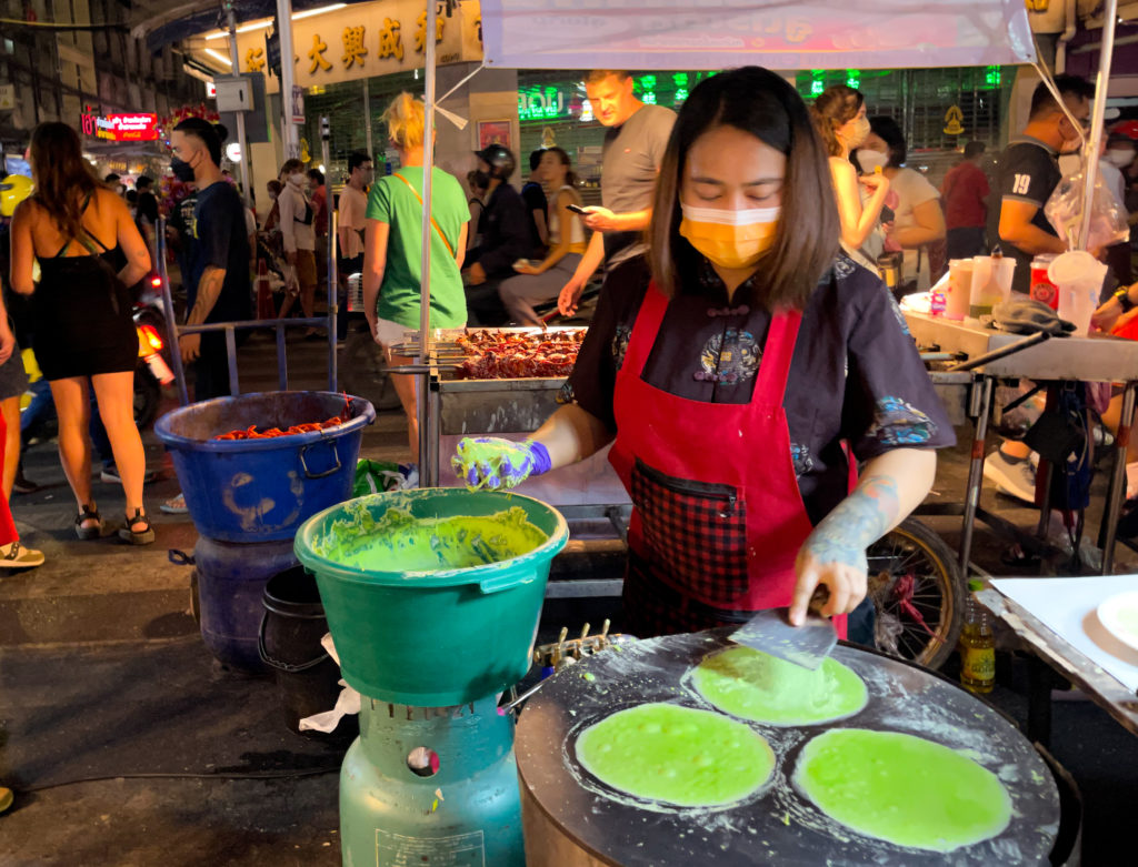 A street food vendor during Lunar New Year celebrations in Bangkok's Chinatown